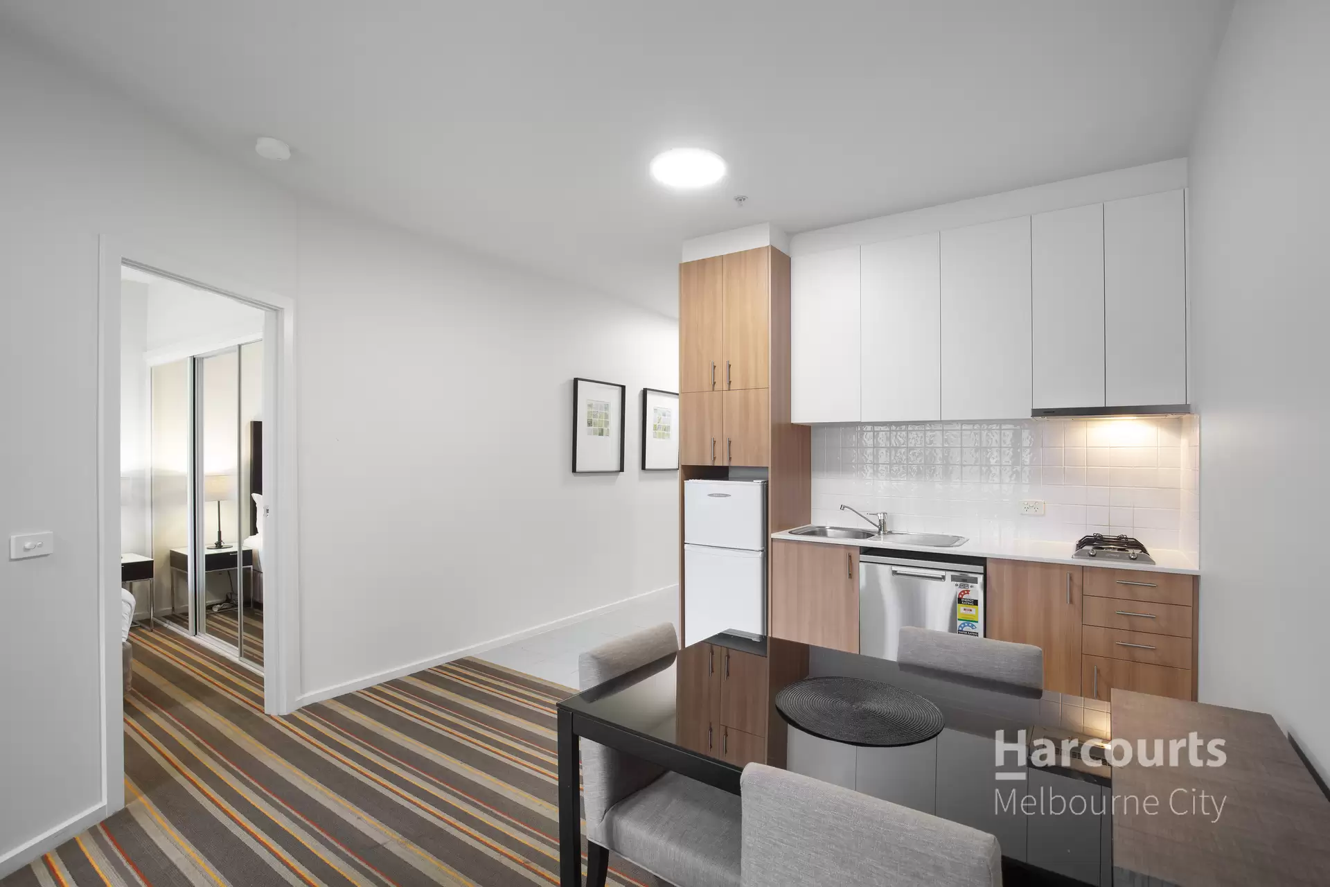 1011/250 Elizabeth Street, Melbourne Sold by Harcourts Melbourne City - image 1